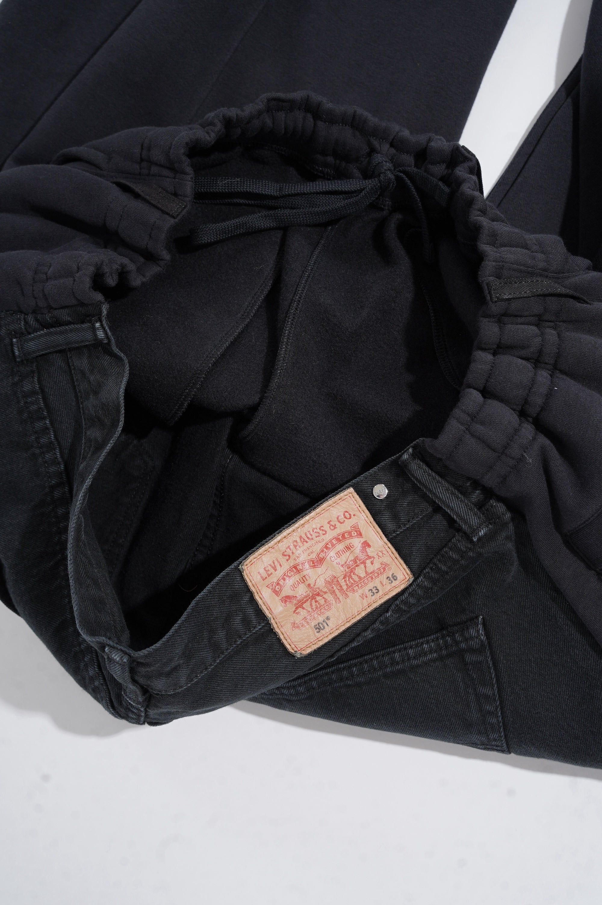 BLESS "OVER JOGGING JEANS" ［BLACK/DENIM BLACK］